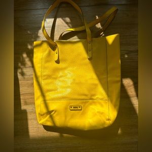 Beautiful roots leather yellow bag
